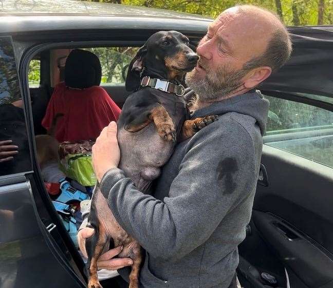 Paul Growns with his Dachshund called Max, who has cancer