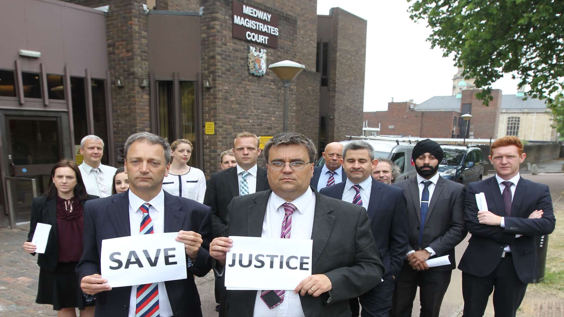 solicitors on strike protesting about cuts to legal aid.