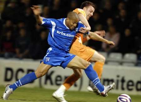 Simeon Jackson tries to find a way past the Luton defence