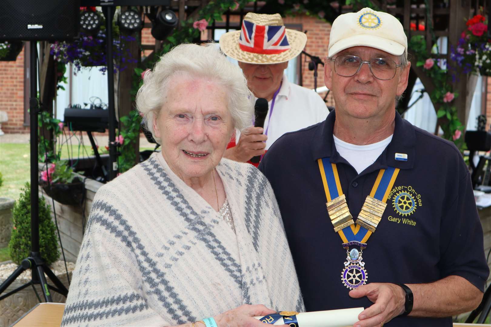 Gwen Croally and president Gary White at Minster-on-Sea Rotary Club's Platinum Jubilee volunteer awards