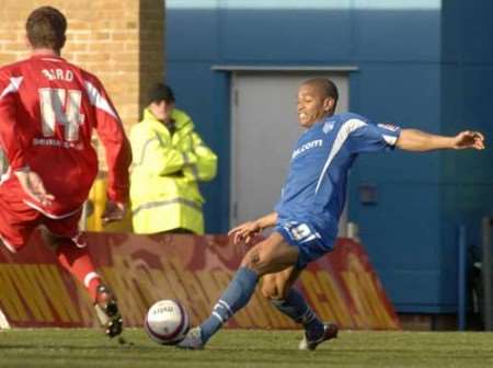 Simeon Jackson in the thick of the action on his Gillingham debut. Picture: GRANT FALVEY