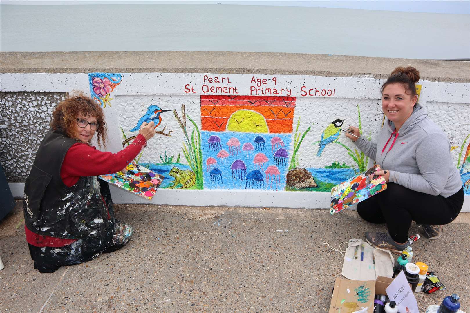Mother and daughter artists Julie Bradshaw-Drury and Anna Piles on Leysdown Promenade
