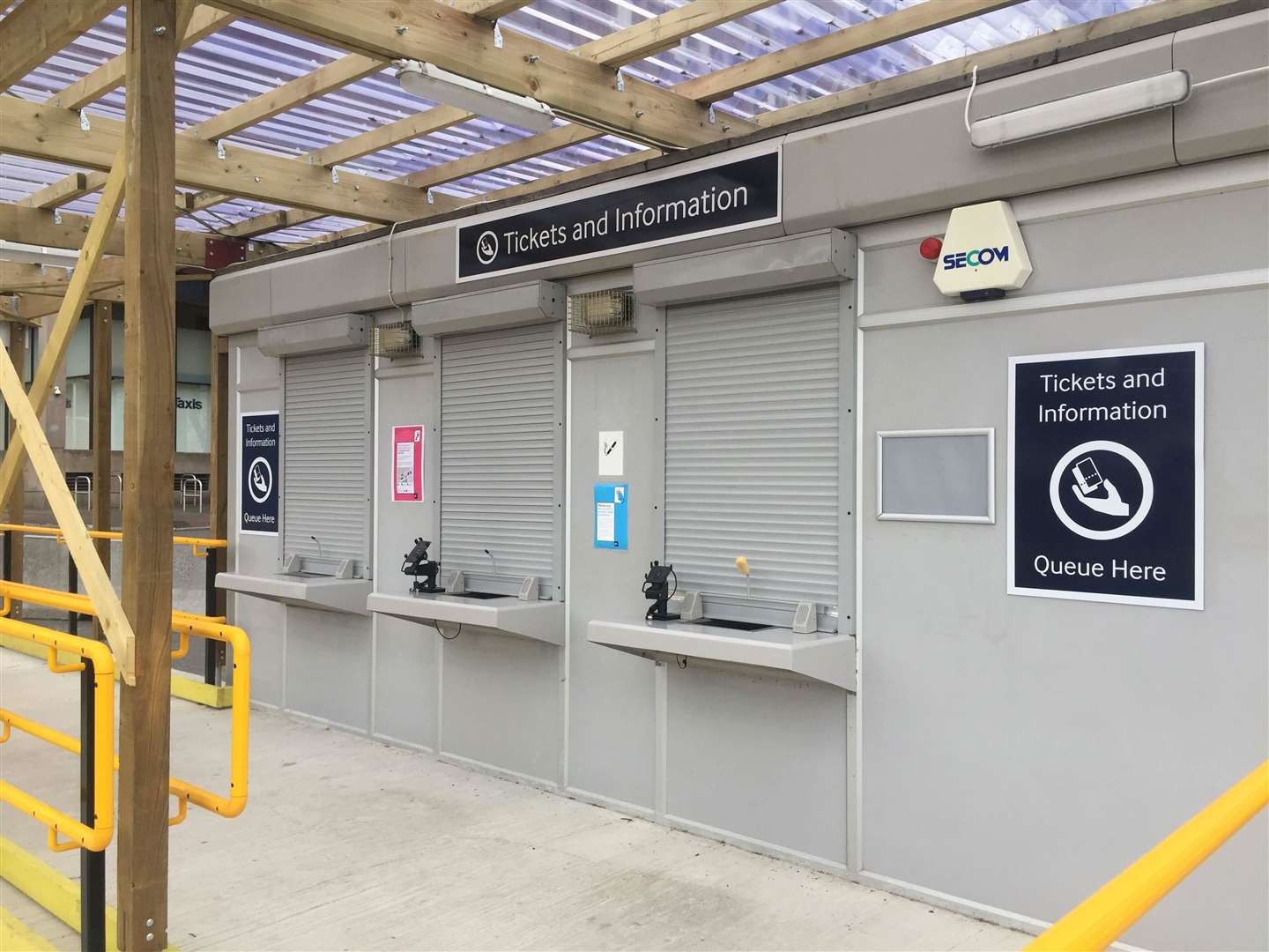 There are three booths at the temporary ticket office which stands separately to the main station