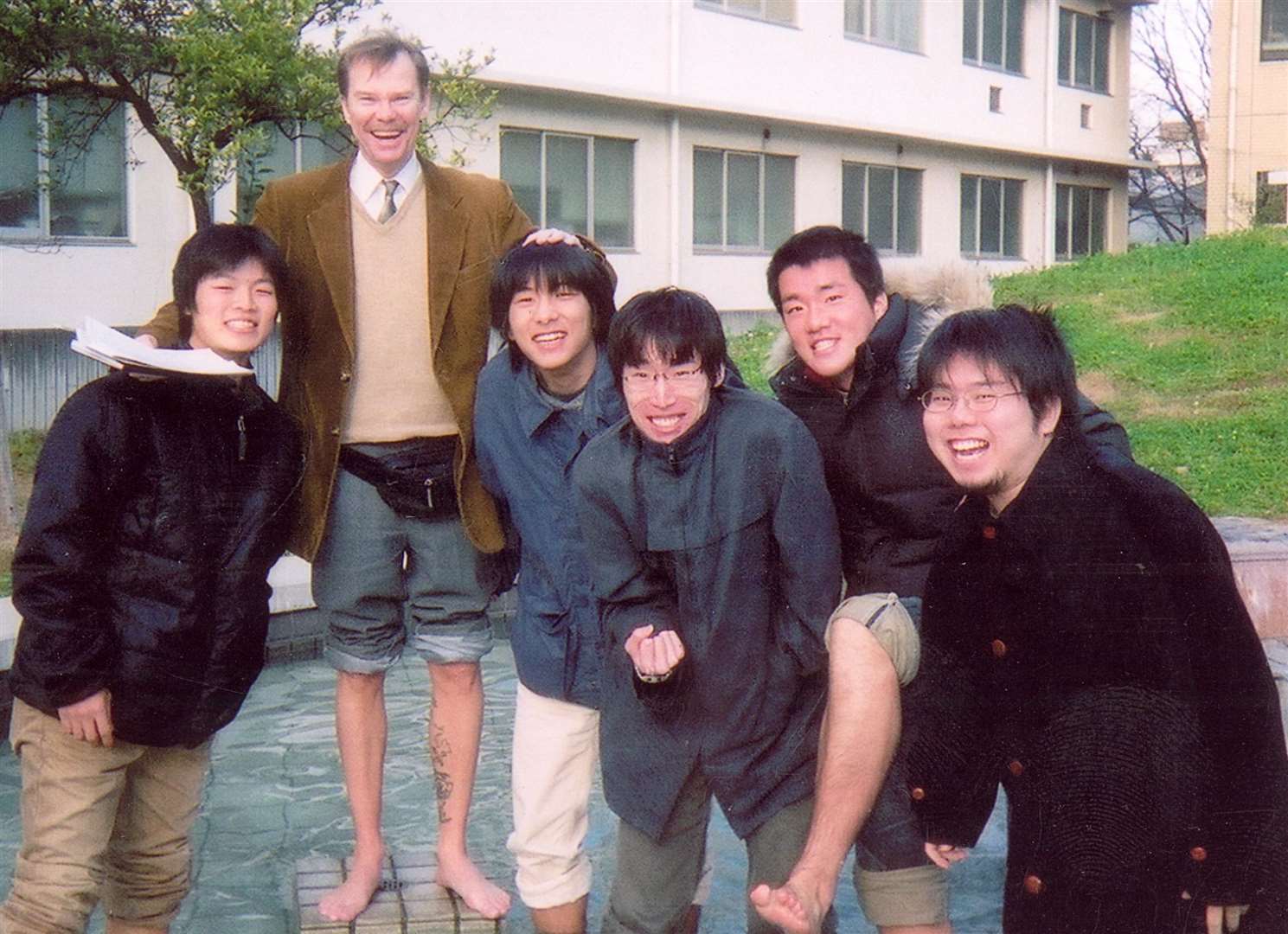 George Meegan with some students while teaching in Japan