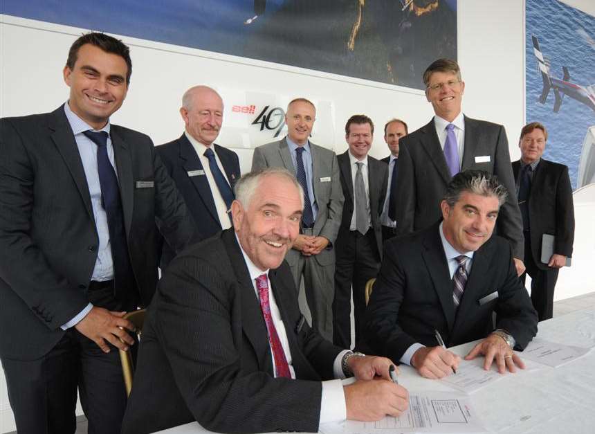Ken Wills of Heli Charter and Bell Helicopters’ Eric Cardinali sign the customer service facility deal at Manston
