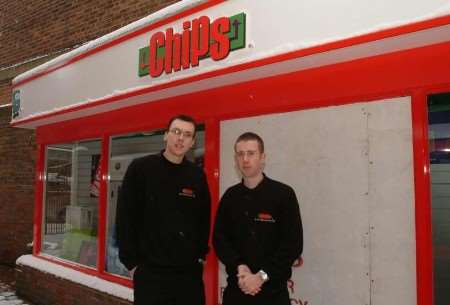 SHOCKED: Chris Muckell, left ,and Stuart McNeill outside their shop. Picture: DAVE DOWNEY
