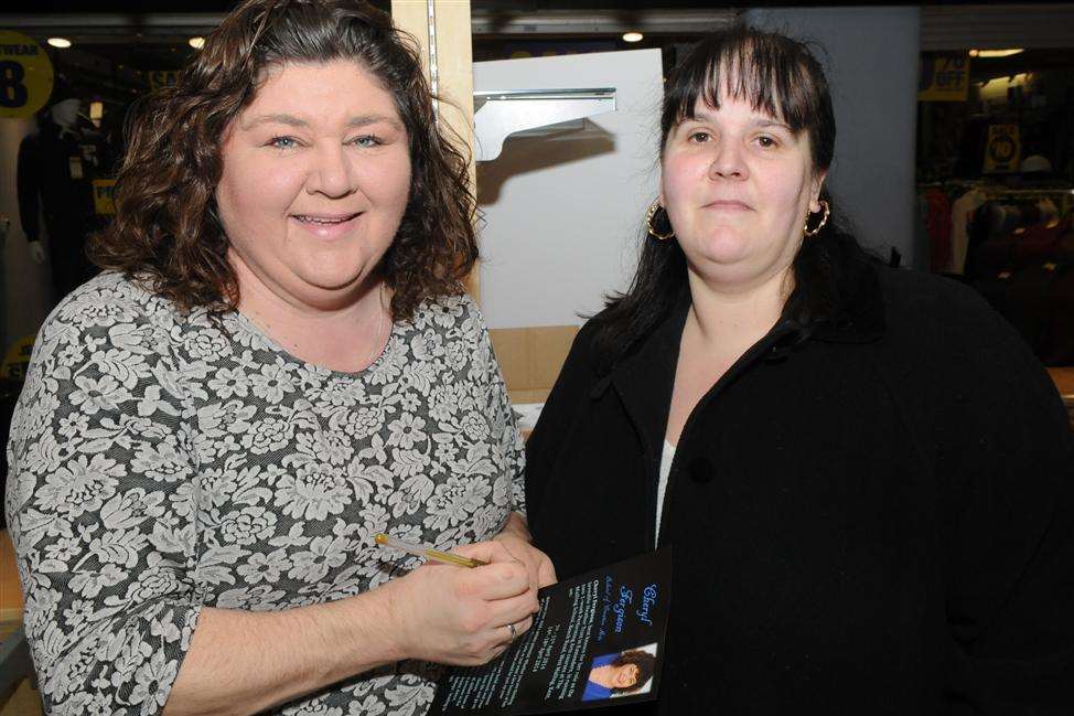 Cheryl Fergison meets fan Zoe Whibley at the Mall Chequers in Maidstone
