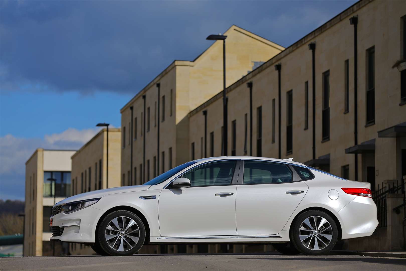The rakish profile, high shoulder line that runs the full length of the car and narrow windows give the Optima a coupe-like profile