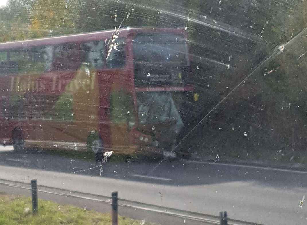 A red double-decker bus was involved in the crash. Picture: Oliver Wilkinson