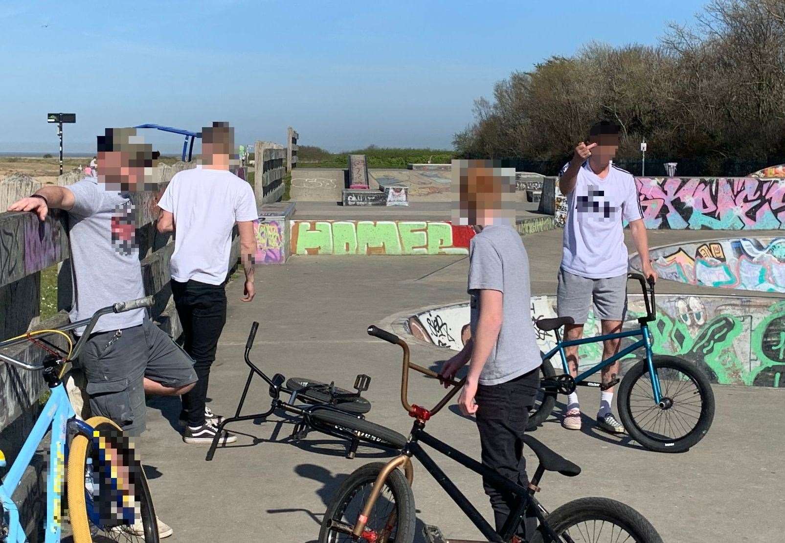 One of the group gives the couple the middle finger after being challenged in the skate park