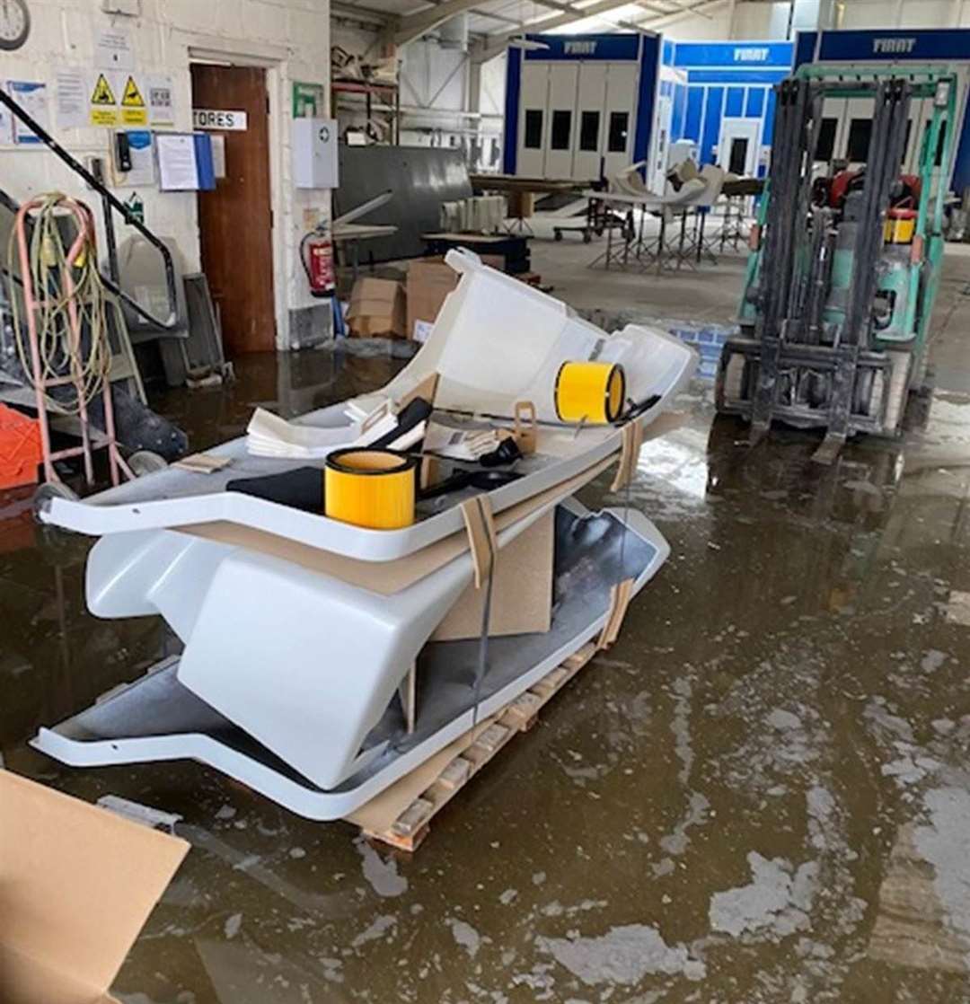 Dartford Composites says it has had to call in tankers to clear the factory floors of flooding