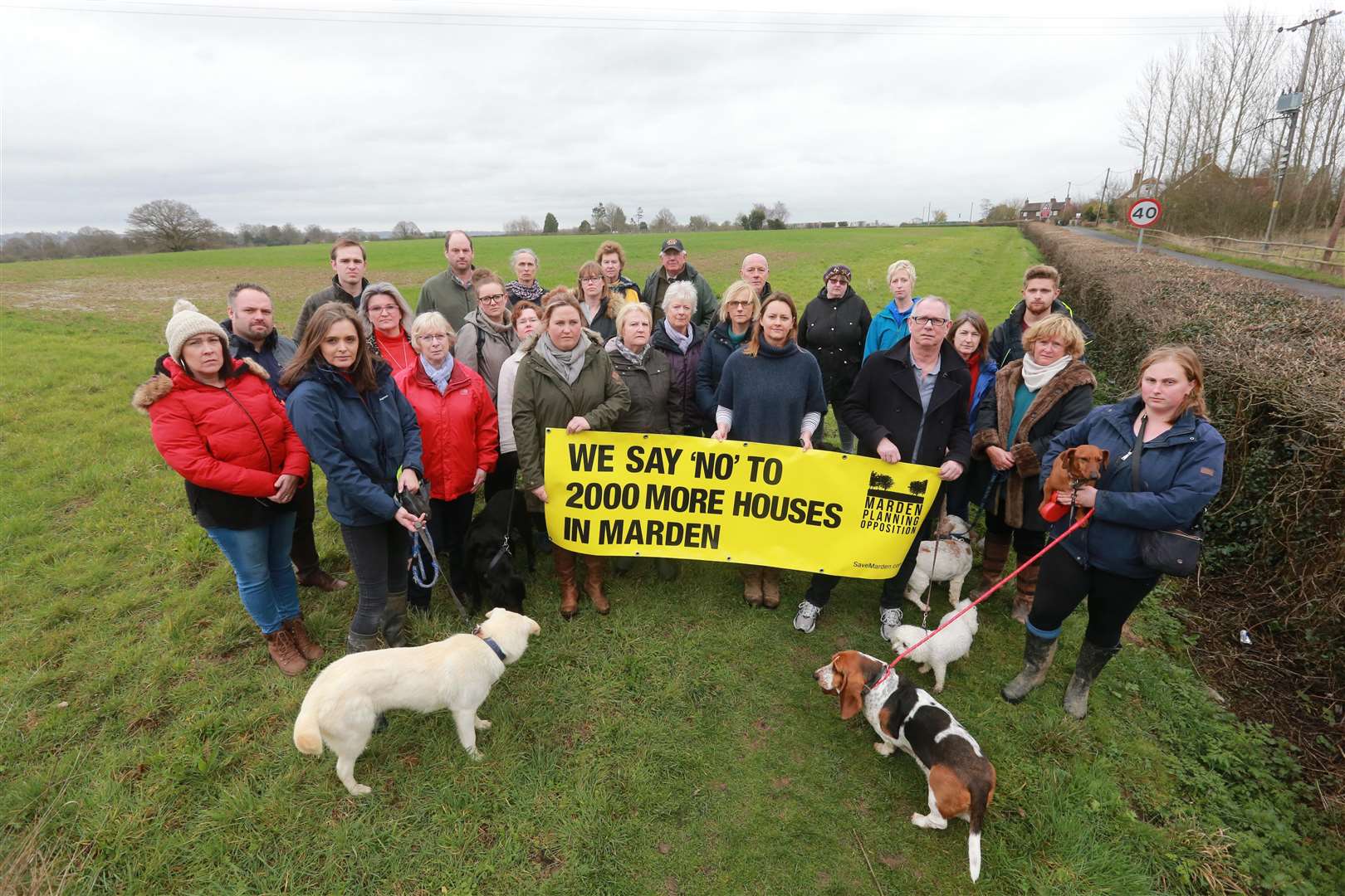 Campiagners on the land where a proposal of 2,000 homes are due to be put in for planning in the small Marden village. Picture: John Westhrop