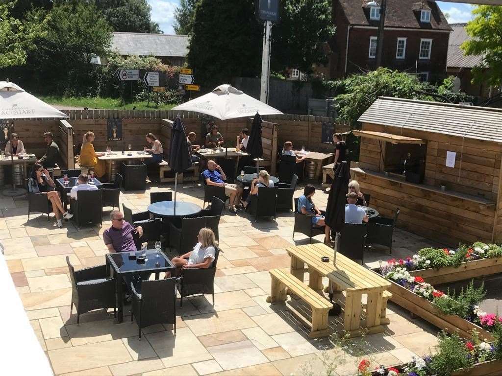 The outdoor courtyard at The Plough at Langley
