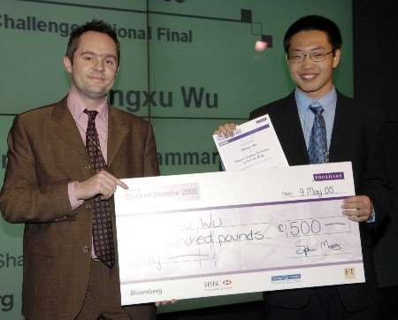 Dongxu Wu receives his prize from the Financial Times' Rob Budden