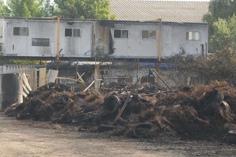 The destroyed tyre yard after the fire