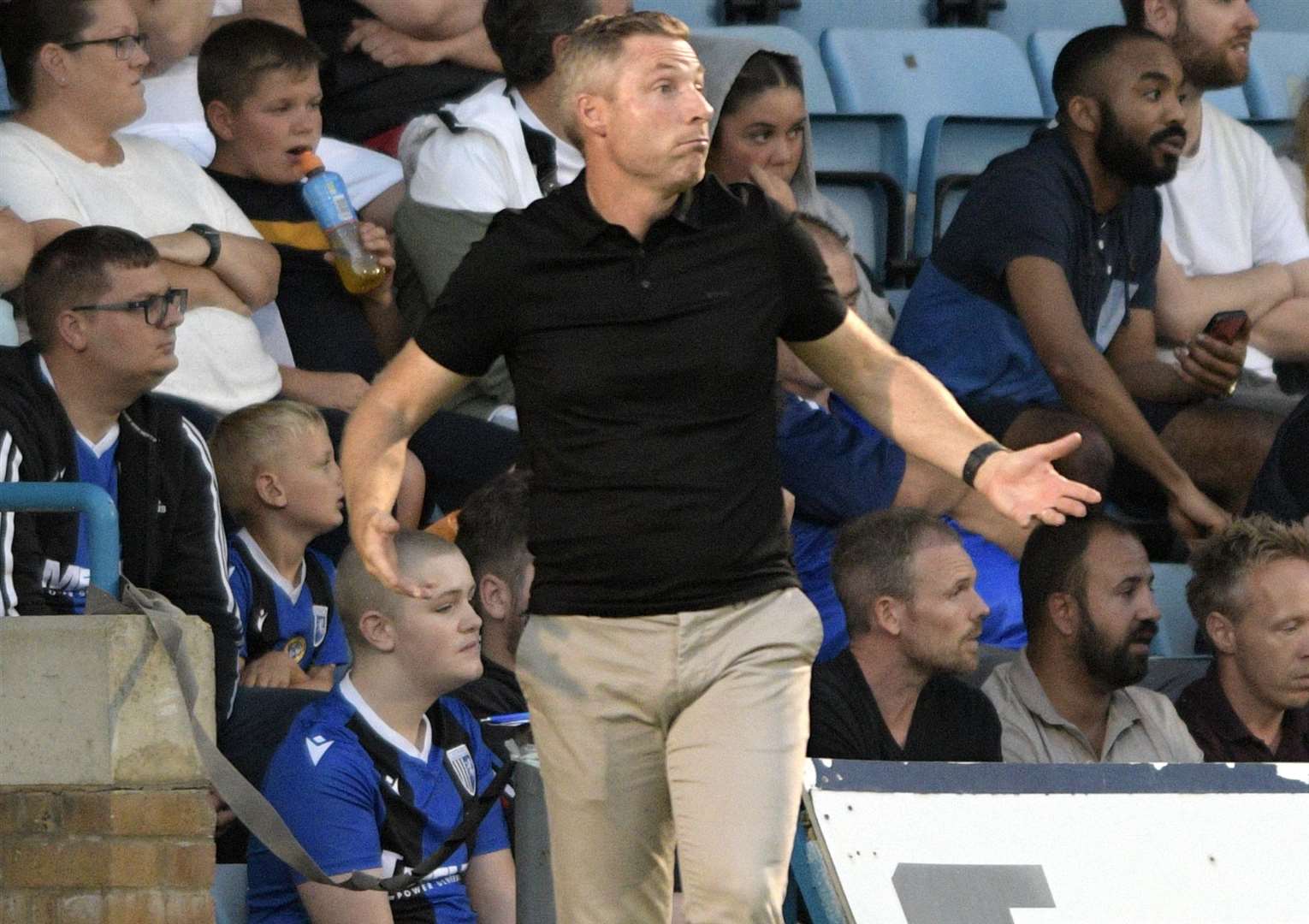 Gillingham boss Neil Harris watches on as his team are beaten by Harrogate. Picture: Beau Goodwin