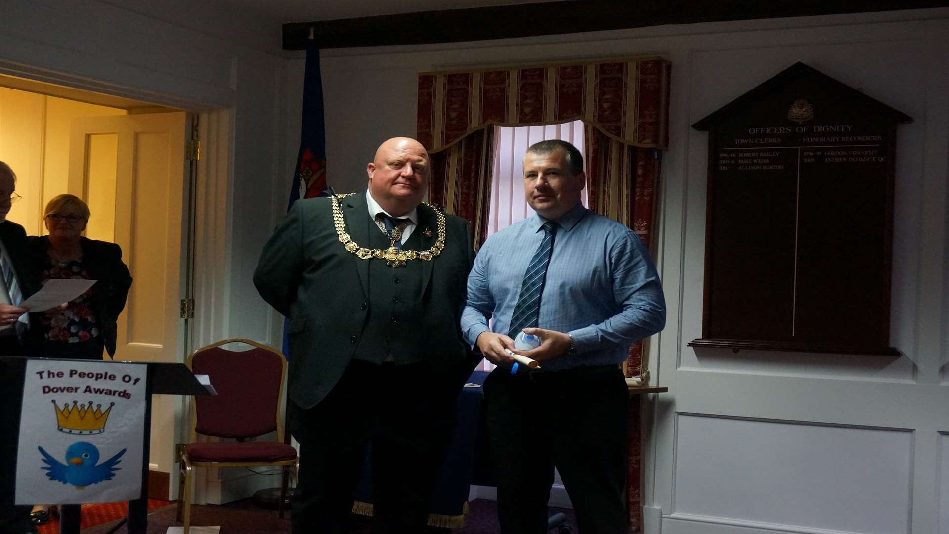 The mayor of Dover Cllr Neil Rix presents an award to Michael Orchard of the Western Heights Preservation Society