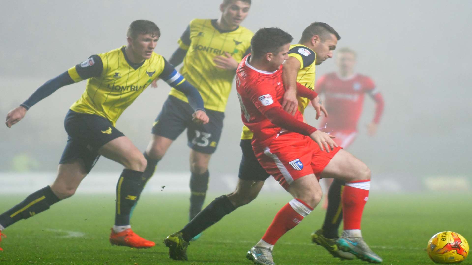 Billy Knott fights for possession amid the gloom Picture: Barry Goodwin
