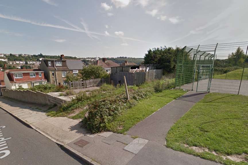 The new gym is being built on disused land between the playground and housing on Shipwright's Avenue. Picture: Google Street View