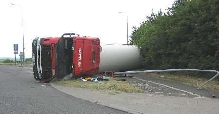 The driver escaped with a broken collarbone after the tanker rolled over. Picture courtesy Kent Police