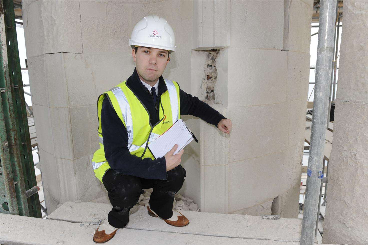 Inspecting the masonry work in my fine shoes