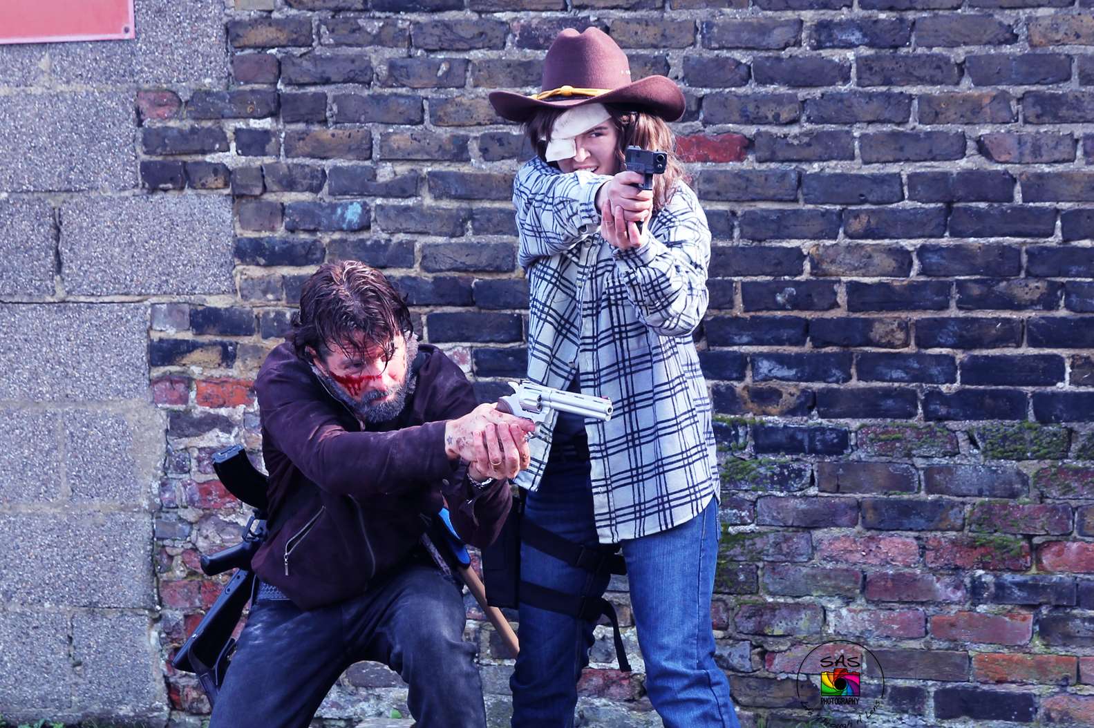 Fabionei Bakhuizen, left, and Reyes Delgado, right, dressed up as Rick and Carl Grimes. Picture: Stephanie Parton (SAS Photography) and Gino Cinganelli