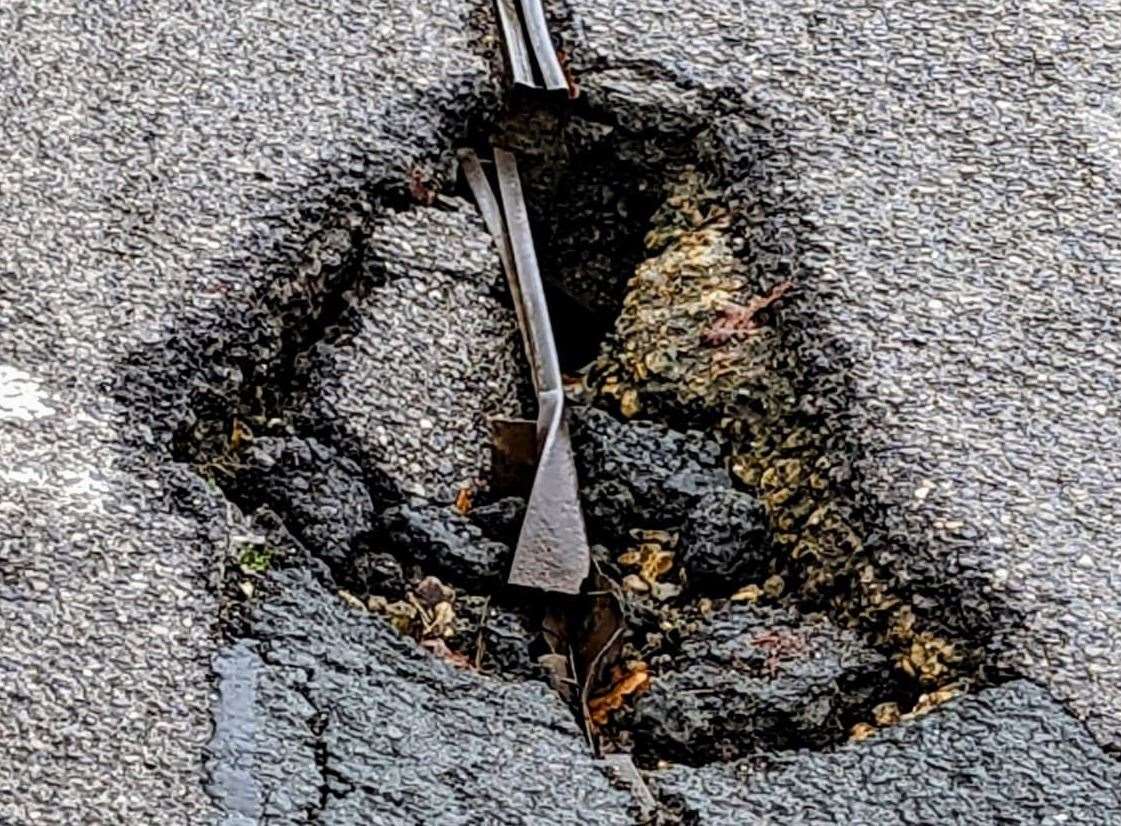The pothole is thought to be six inches deep