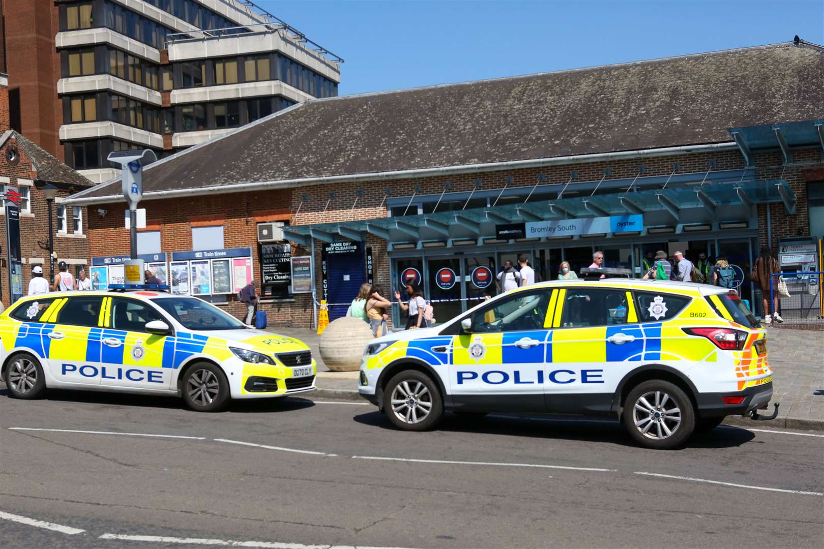 Police remain at Bromley South as they investigate the attack. Picture: UKNIP