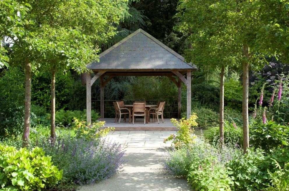 Take a seat in the pavilion and take in the beautiful landscaped gardens. Picture: Knight Frank