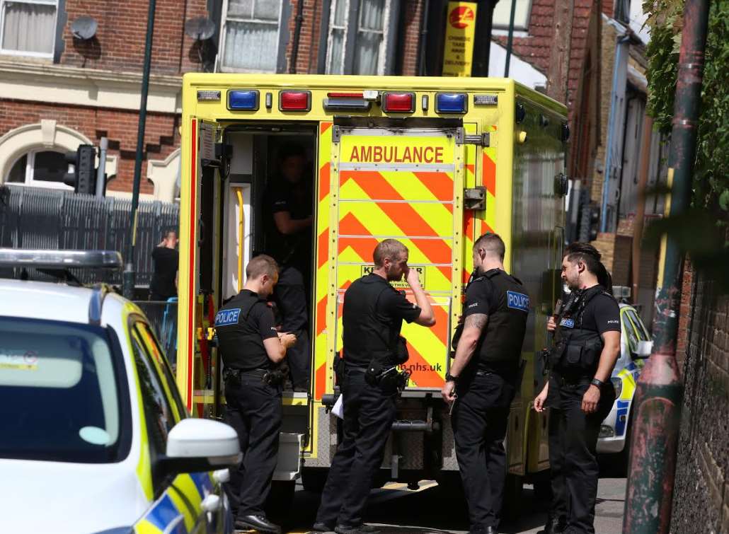 An ambulance and police officers at the scene. Pic: Keith Thompson