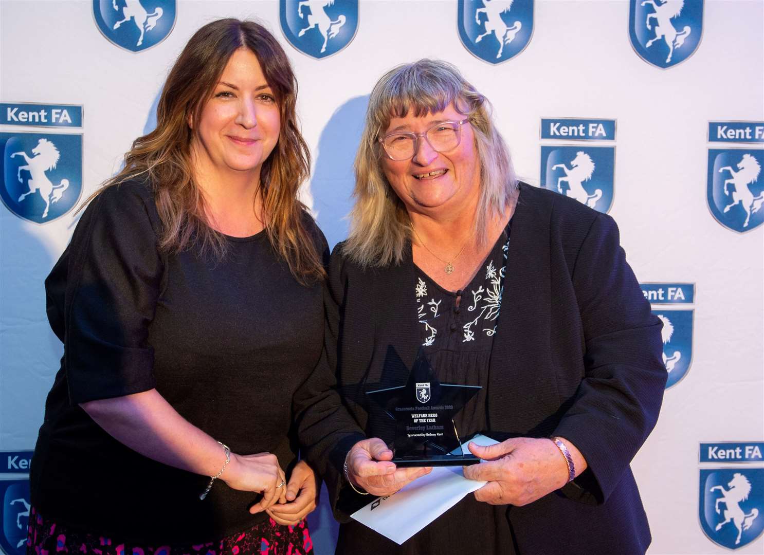 Beverley Latham collects her Welfare Hero Of The Year award. Picture: Ian Scammell