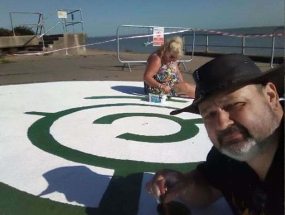 Sheerness artist Richard Jeferies working on his Alice in Wonderland maze on the promenade at The Leas, Minster, for Minster parish council before it was removed