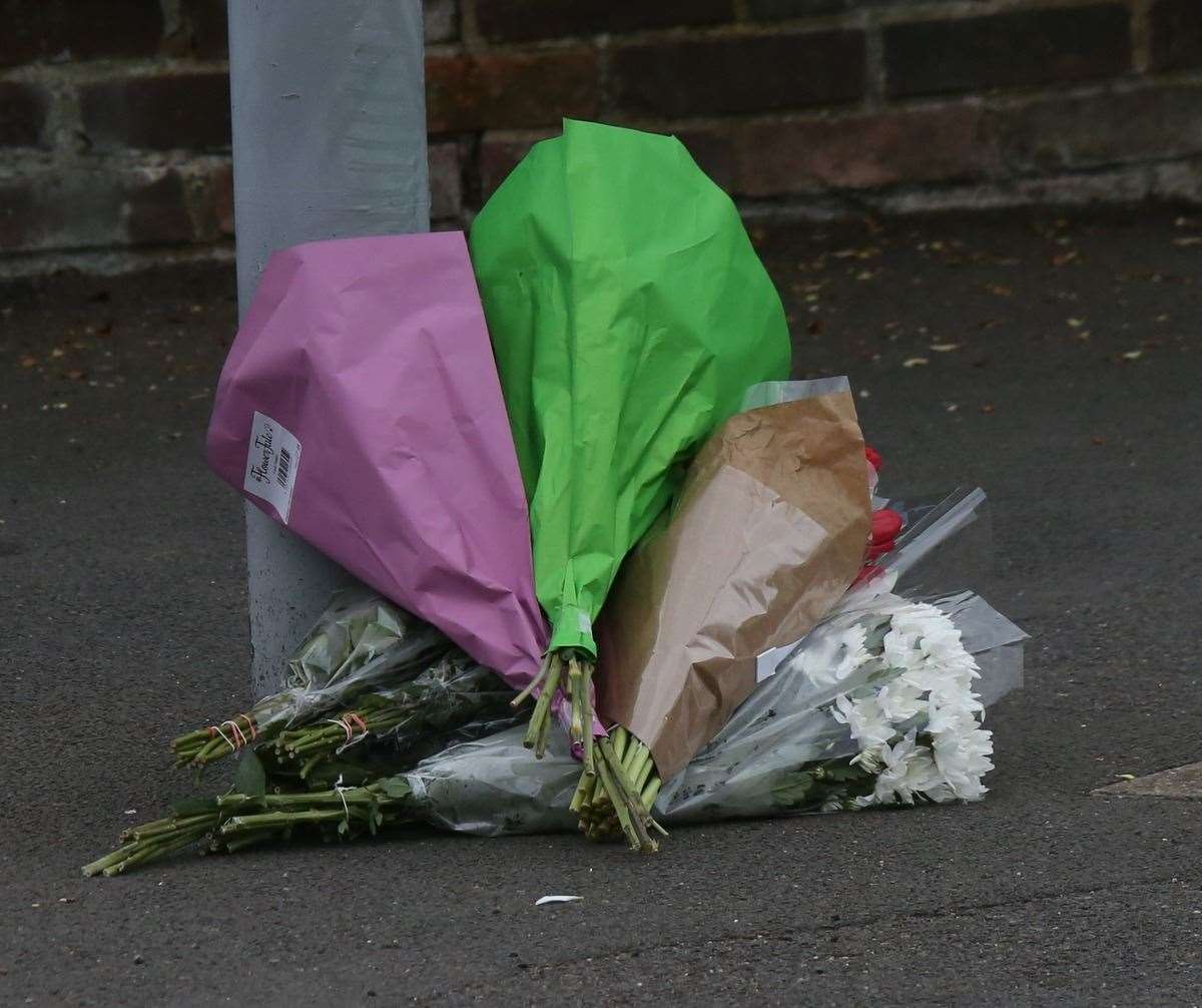 Flowers laid at the scene of Kyle's death. Picture: UK News in Pictures