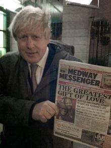 Mayor of London, Boris Johnson, with a copy of the Medway Messenger.