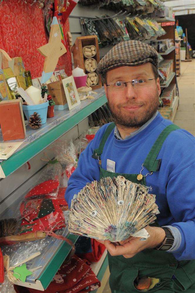 Simon Thomas, 41, with a paper hedgehog