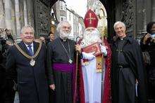 Canterbury St Nicholas Parade.St Nicholas arrieves at the Gatres of Canterbury Cathedral to be greeted by the Archbishop