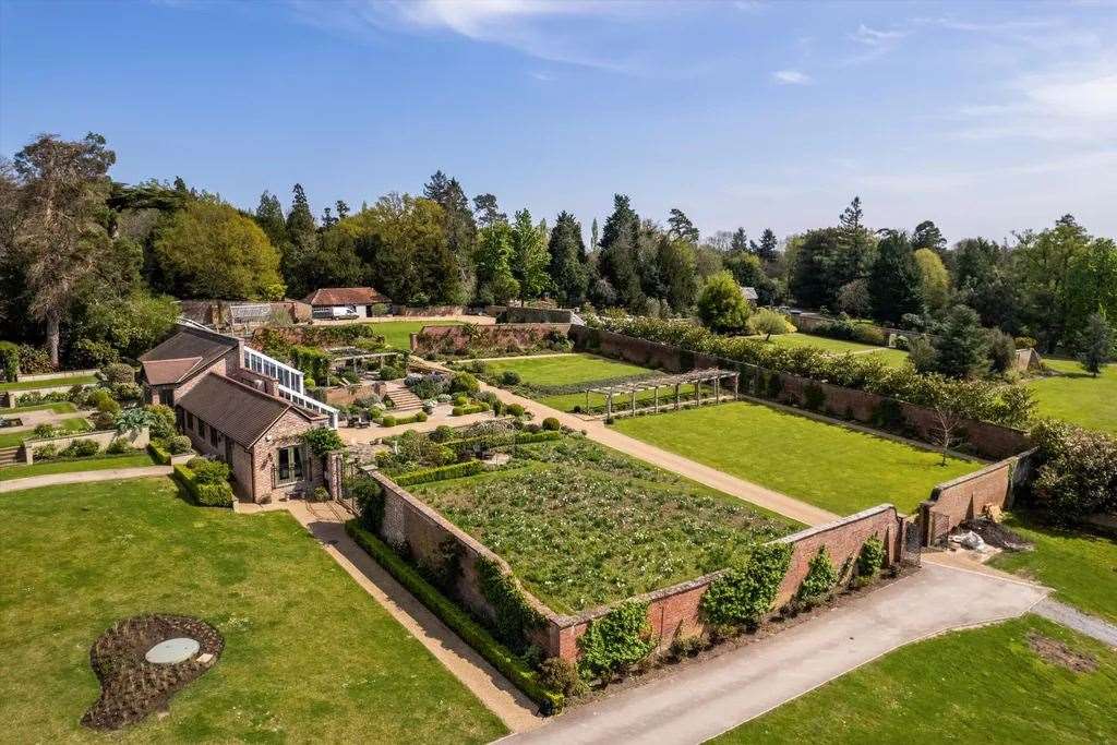 From the formal gardens to the vegetable garden and green house, this property is perfect for those with green fingers. Picture: Knight Frank