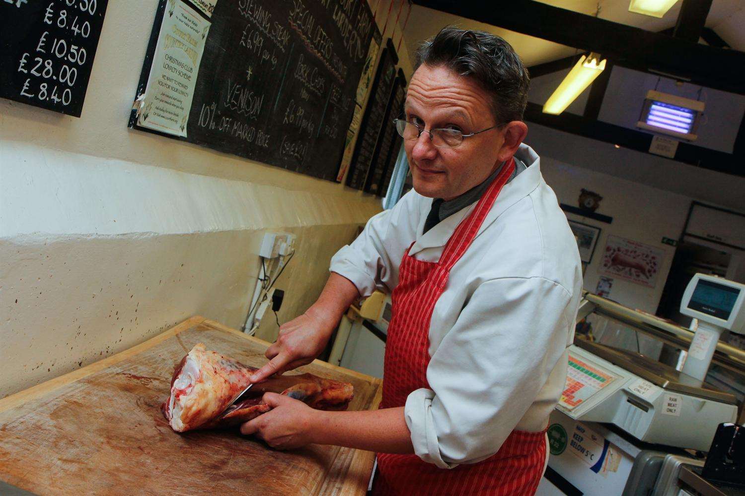 Will Reid, who chatbot Billy the Butcher will be based on, at work in Court Farm Butchery and Country Larder