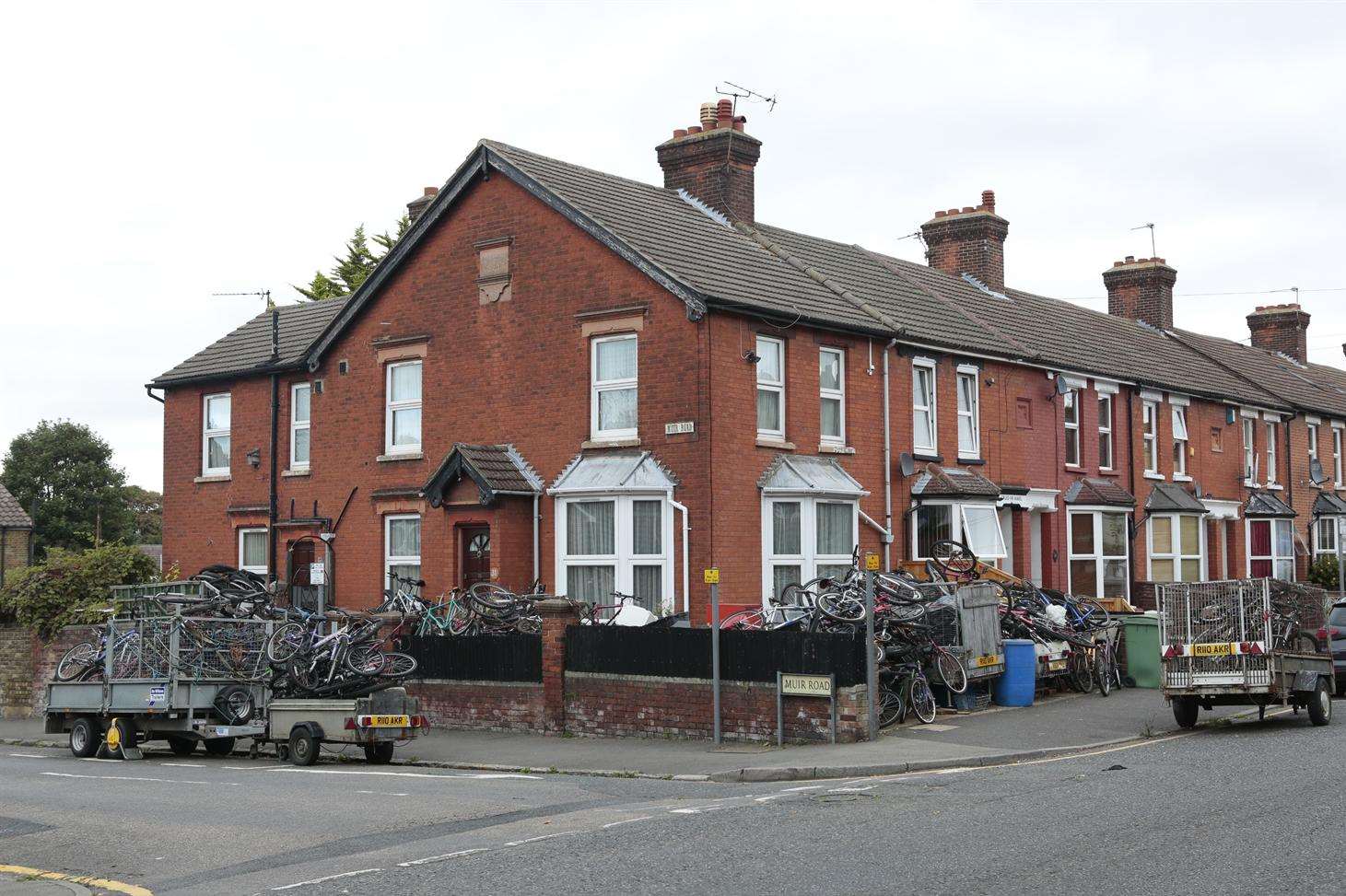 Hundreds of bikes piled high outside the house which has apparently become an eyesore