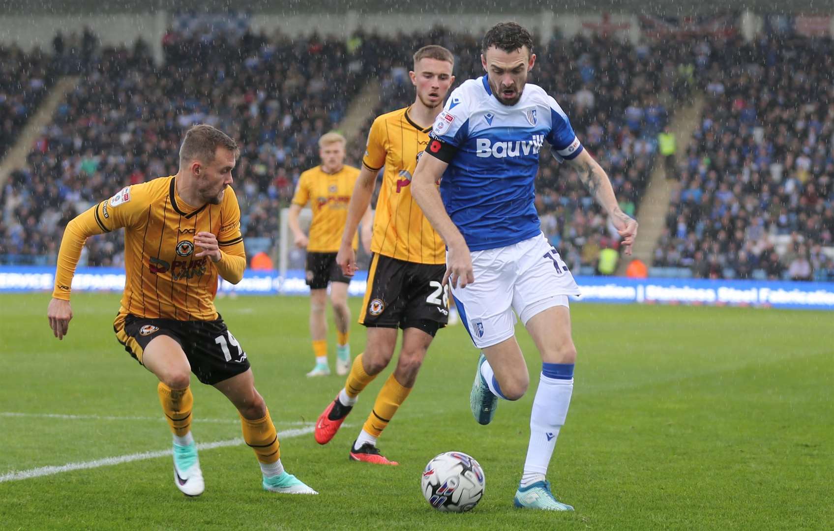 Scott Malone takes on his man as the Gills play Newport Picture: @Julian_KPI