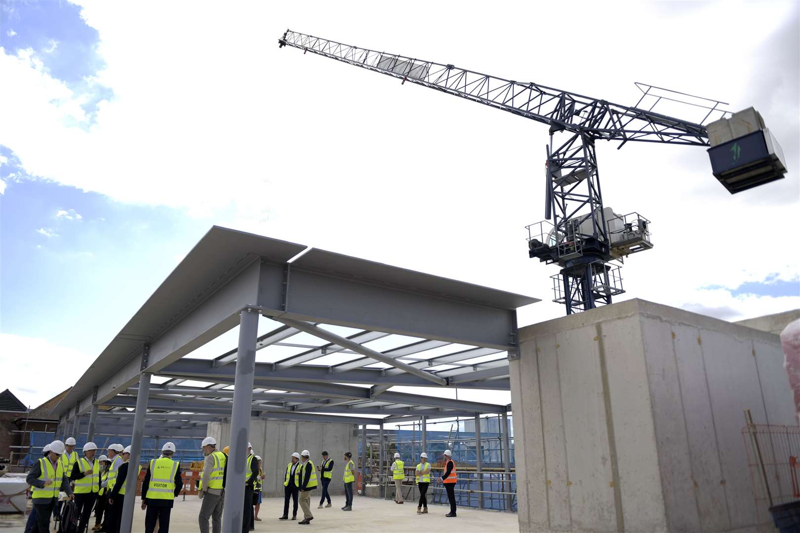 About 25 guests attended Tuesday's topping out ceremony