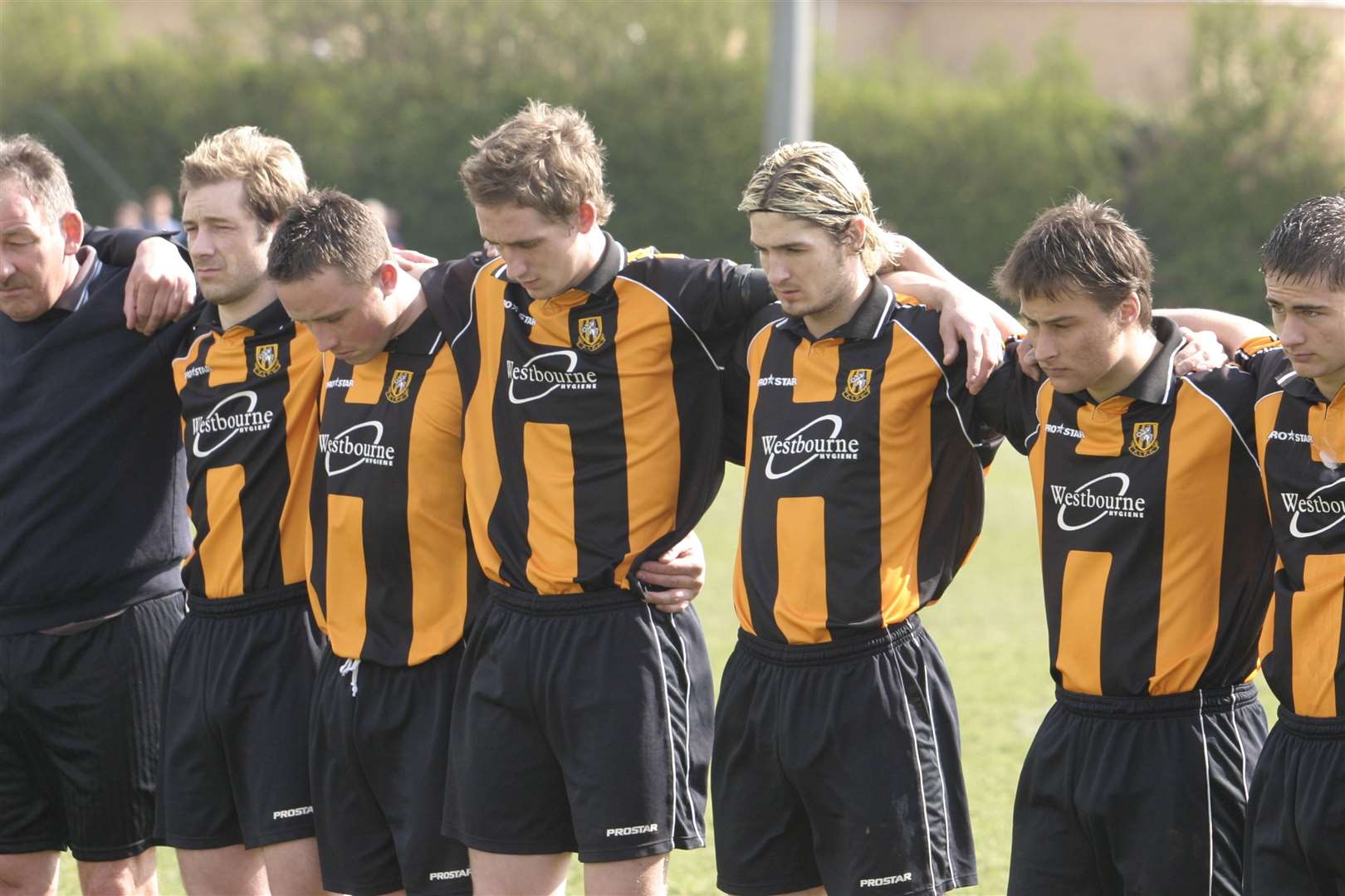 Folkestone's players fall silent for their team-mate