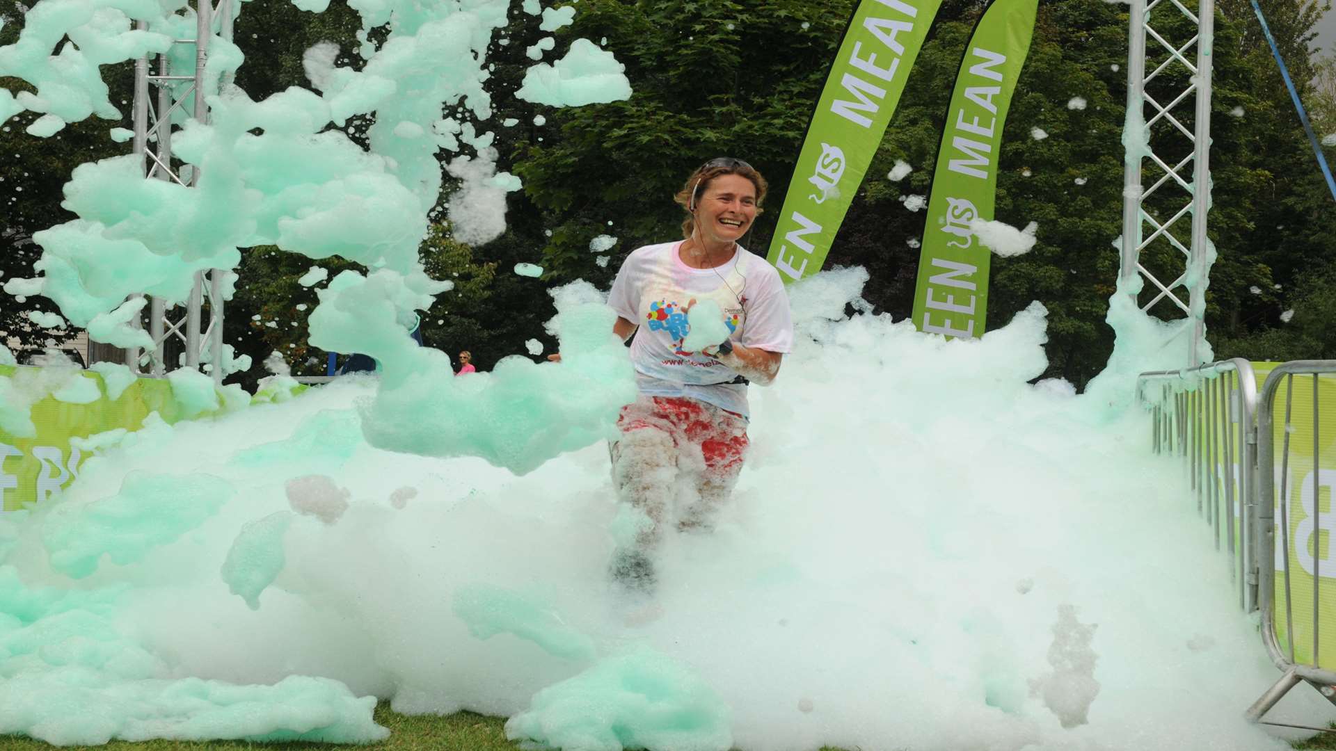 Runners sprinted through walls of coloured foam