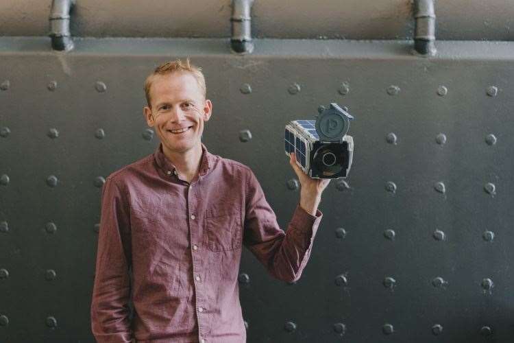 Will Marshall, CEO of Planet, with one of his cube satellites
