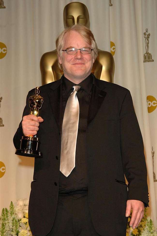 Philip Seymour Hoffman with his Oscar. Picture: Ian West/PA Photos