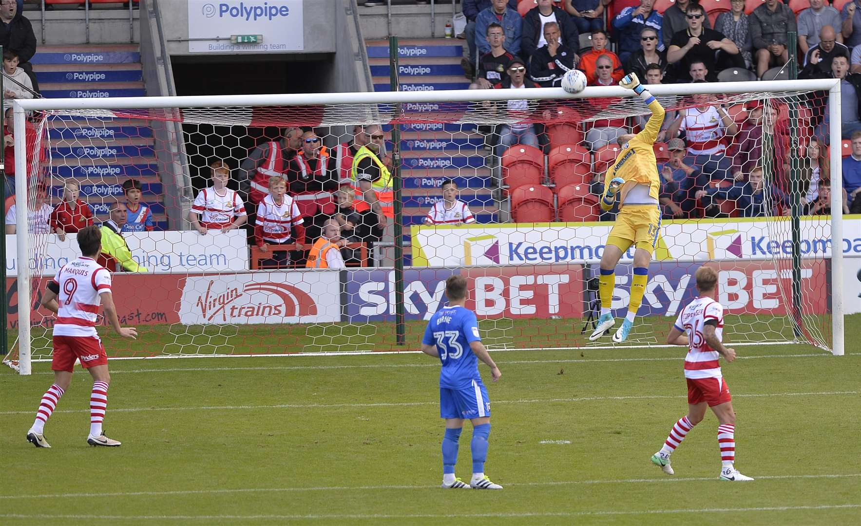 Gillingham’s Tomas Holy is finally beaten but Doncaster are denied by the crossbar Picture: Ady Kerry