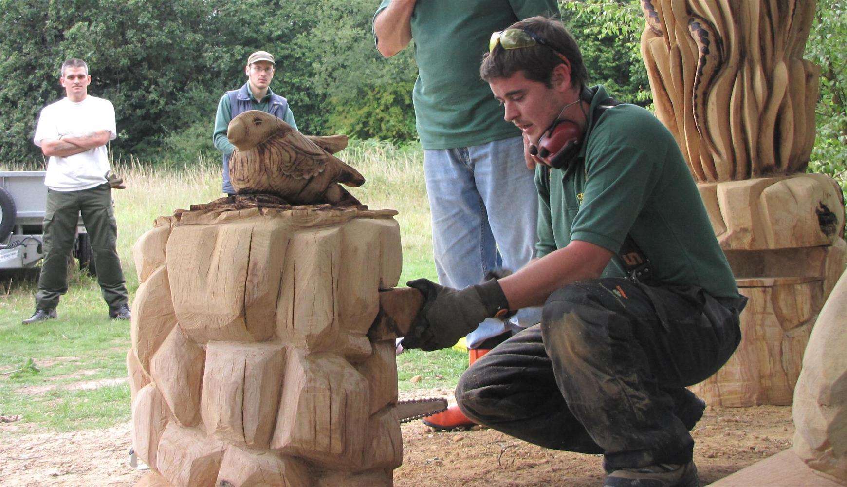 'Chainsaw Dave' Lucas in action on a previous sculpture