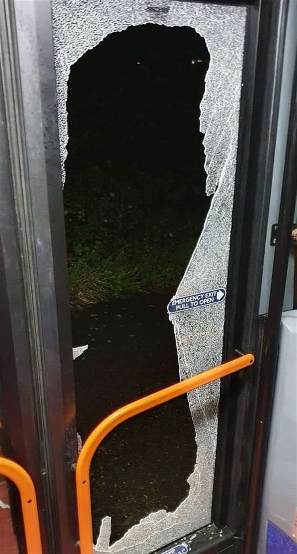 A smashed bus door. Picture: Matthew Arnold/Twitter