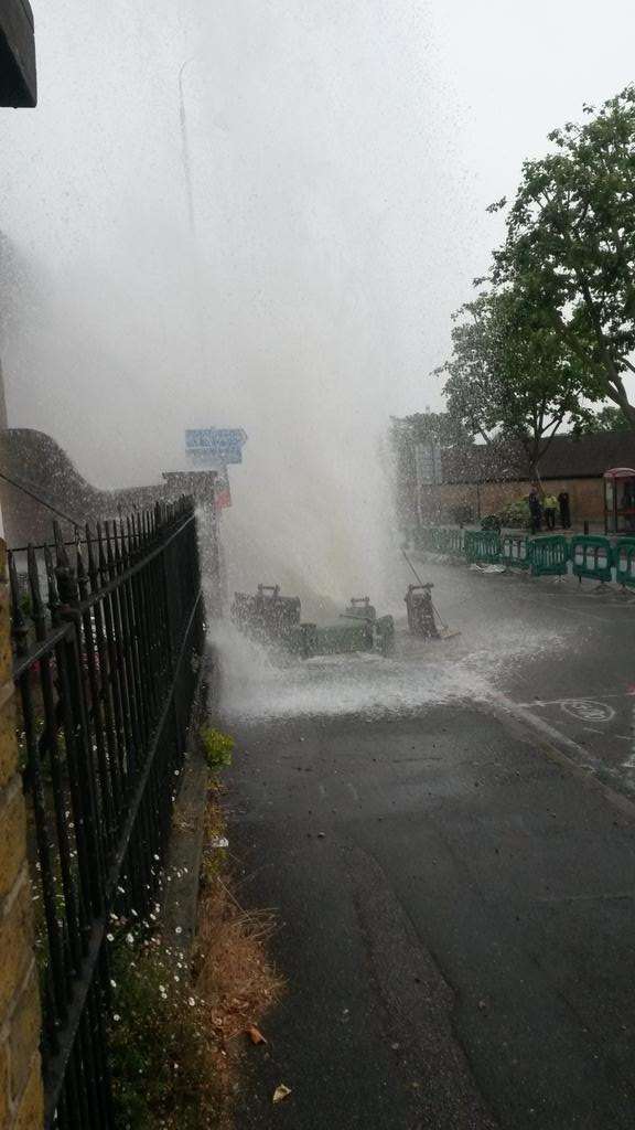 The burst water main is spraying several feet into the air. Picture: @Kent_999s