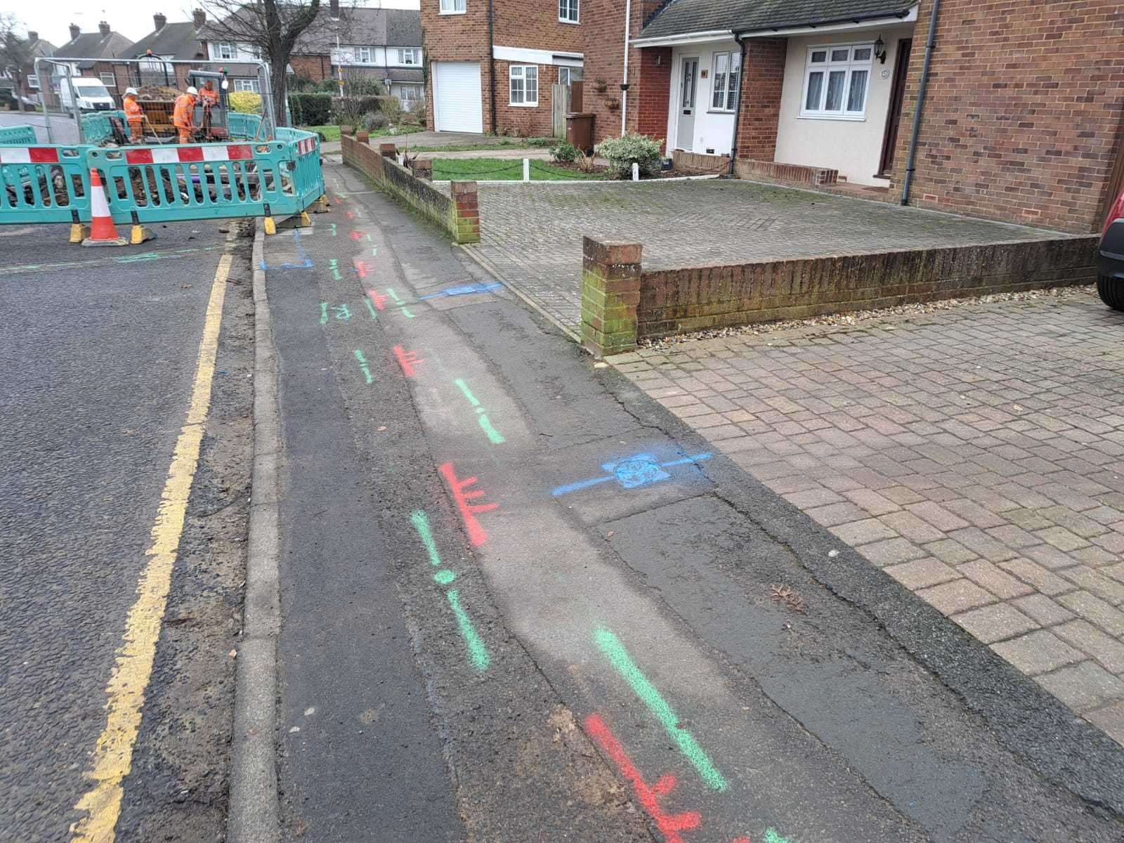 CityFibre works in Berengrave Lane, Rainham, with pre-existing utilities marked out with spray paint